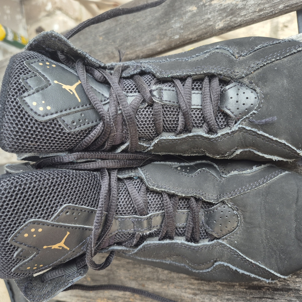 Jordan Black and Gold Sneakers with Reflective Detailing